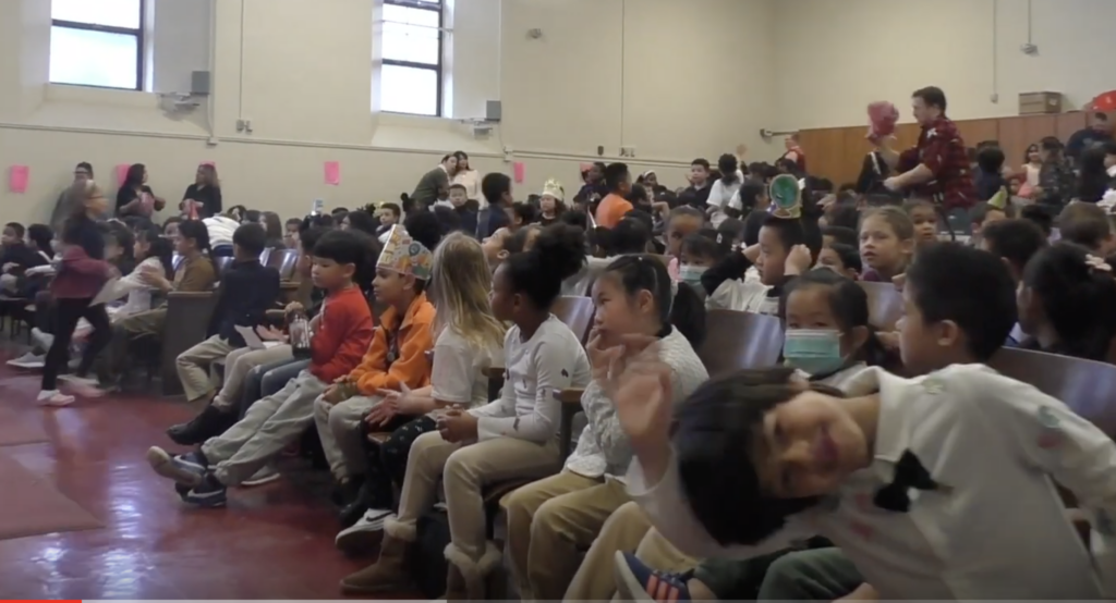 Parents in Mayfair auditorium.